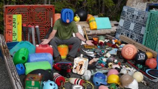 Pete with marine and tsunami debris